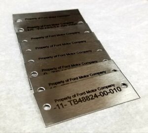 Black laser marking on stainless steel industrial tags