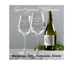 2 custom laser etched wineglasses with wedding couples name and date